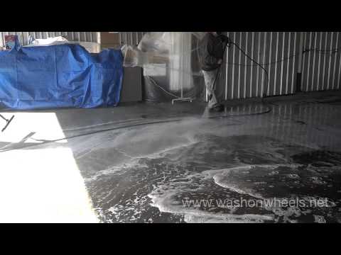 Pressure Washing An Airplane Hangar