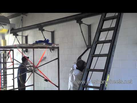 Pressure Washing The Inside Of A Car Wash -- Video