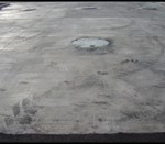 Tire marks before construction pressure washing