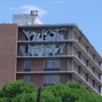 Graffiti on high rise building removed by Wash On Wheels