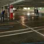 Pressure Washing The Lines In A Parking Garage