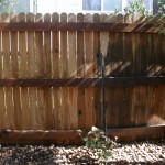 Wood Fence Damaged By Amateur Pressure Washing Company
