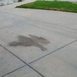 Driveway Before Pressure Washing Grease Spill