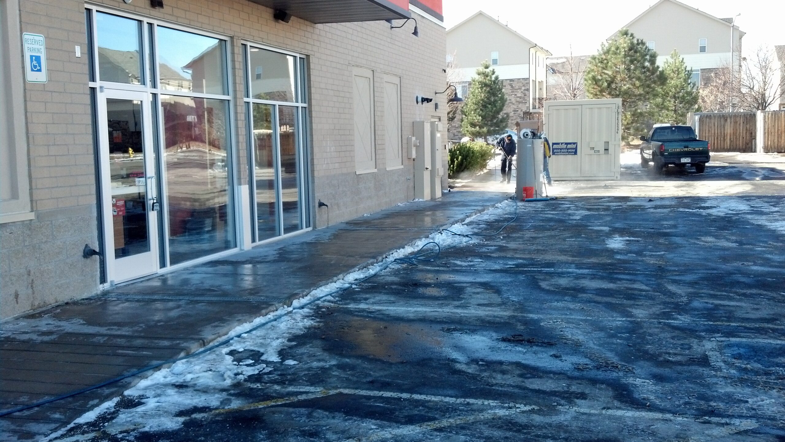 Pressure Washing Sidewalks in Denver, Colorado in December