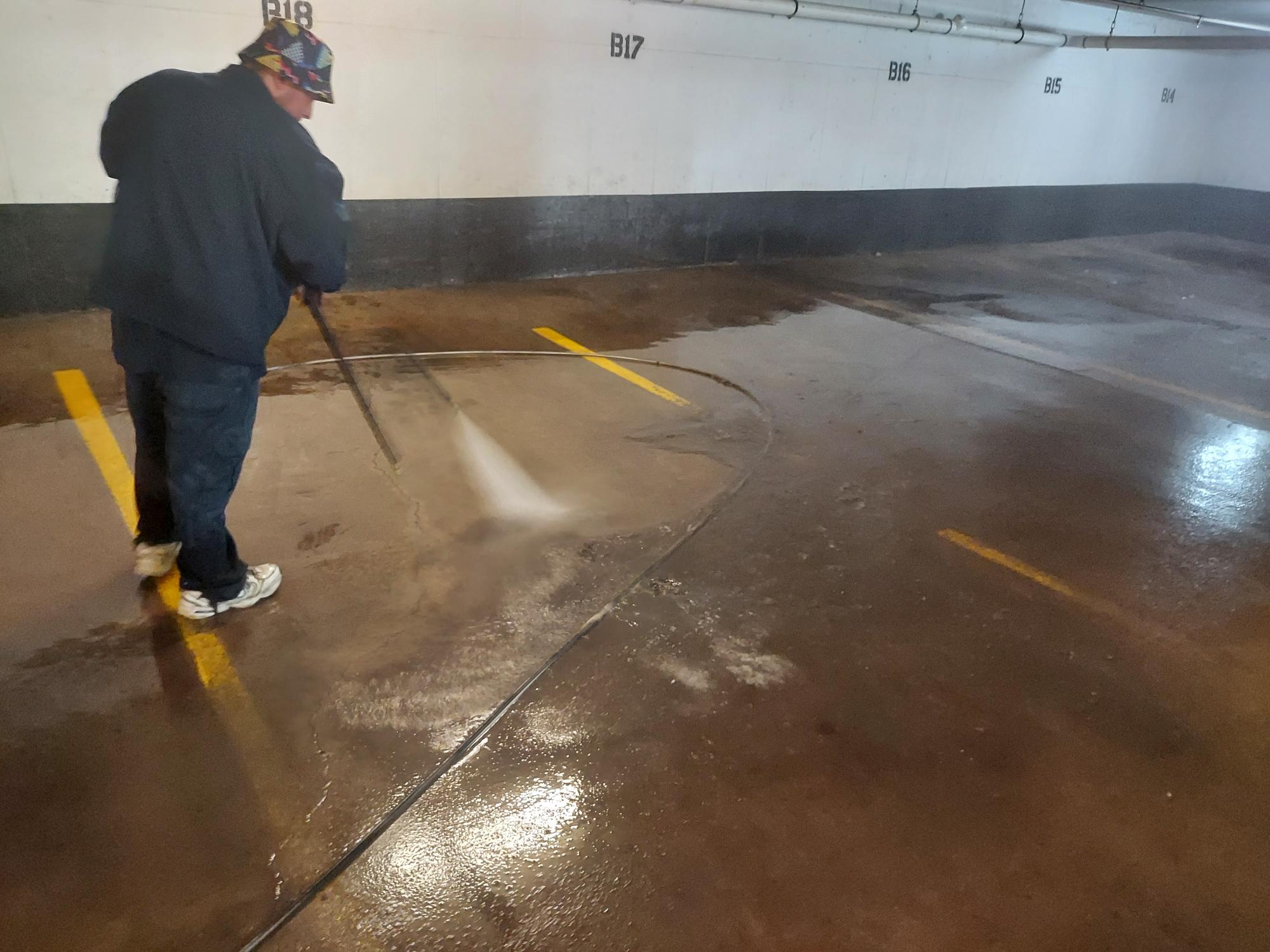 Pressure Washing a parking garage in Littleton, Colorado