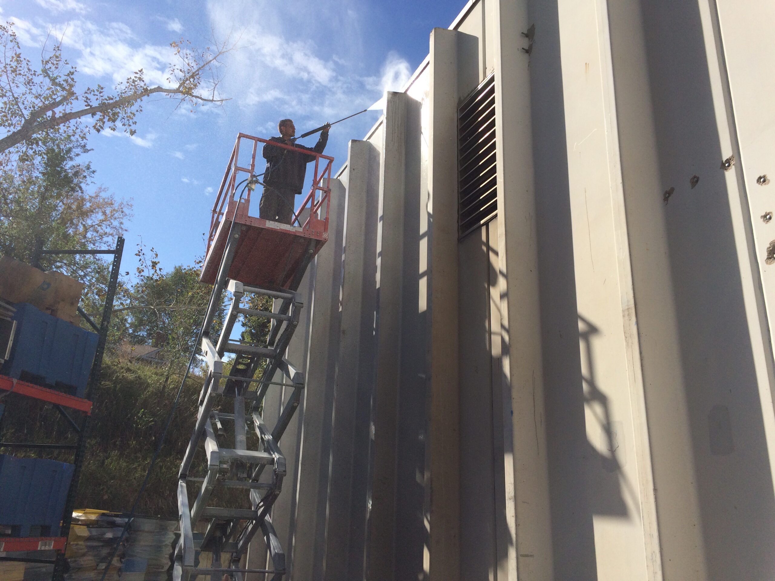 Pressuring washing a manufacturing complex in Englewood, Colorado