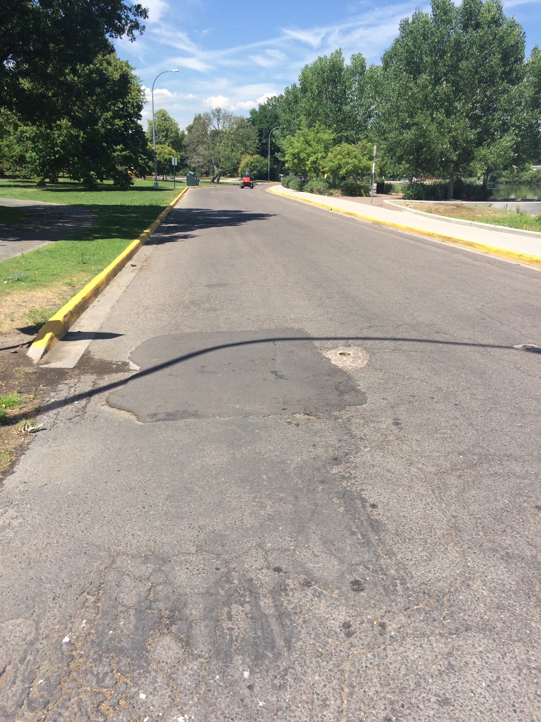 Pressure Washing With Water Recovery To Remove Bike Race Markings From Roadways - After