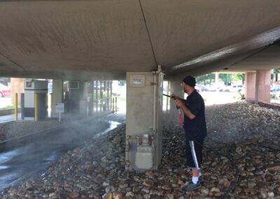 Pressure washing a bank building in Boulder, Colorado