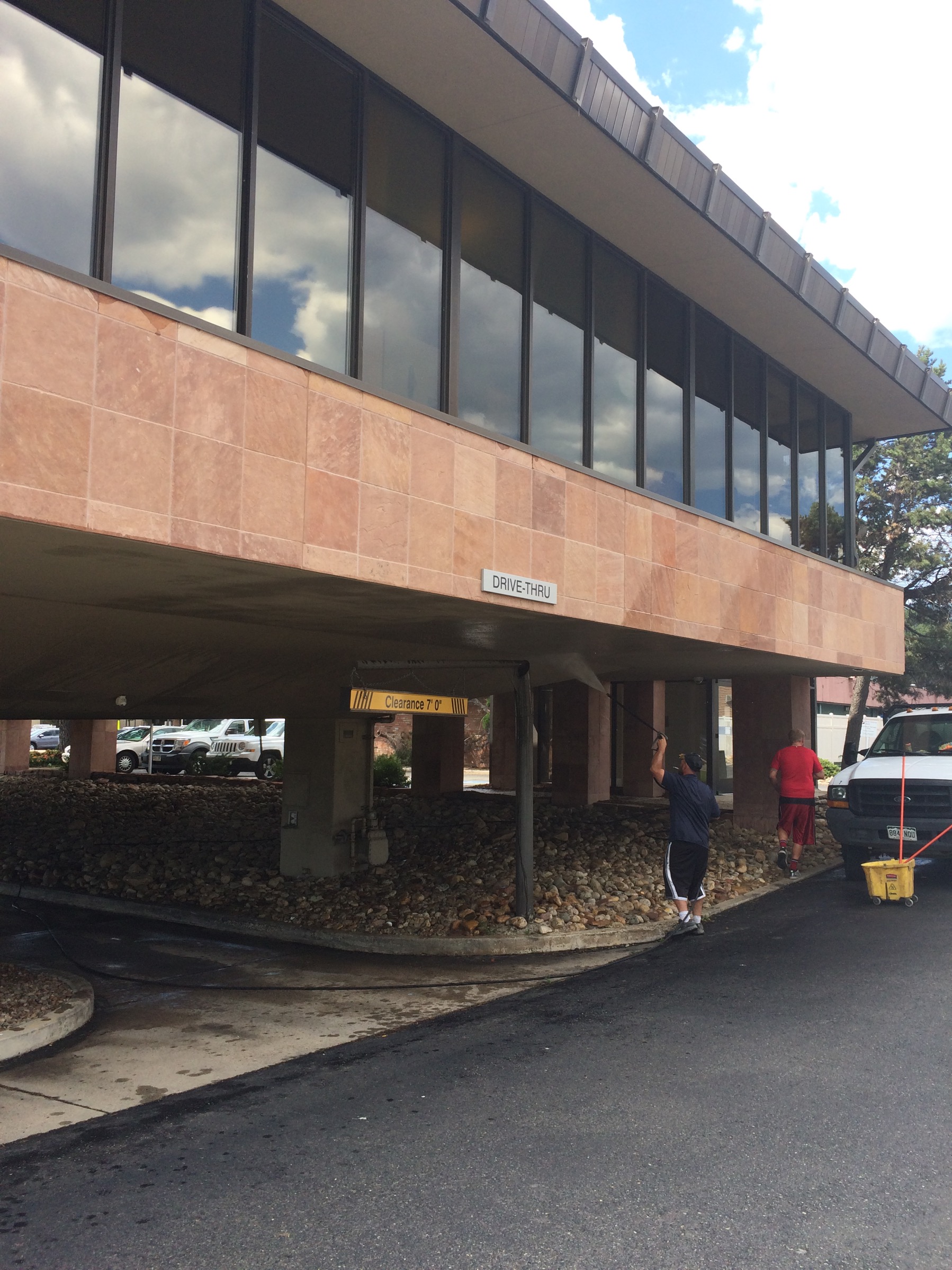 Washing a building exterior in Boulder, Colorado