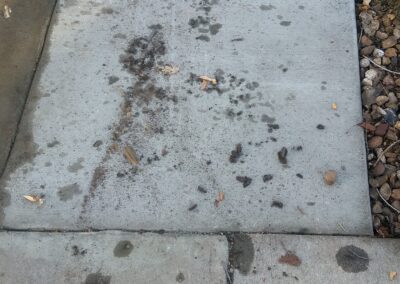 Hydraulic oil spill cleanup on a Denver, Colorado driveway