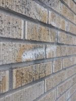 Amateur Graffiti Removal Destroys Brick Wall 02