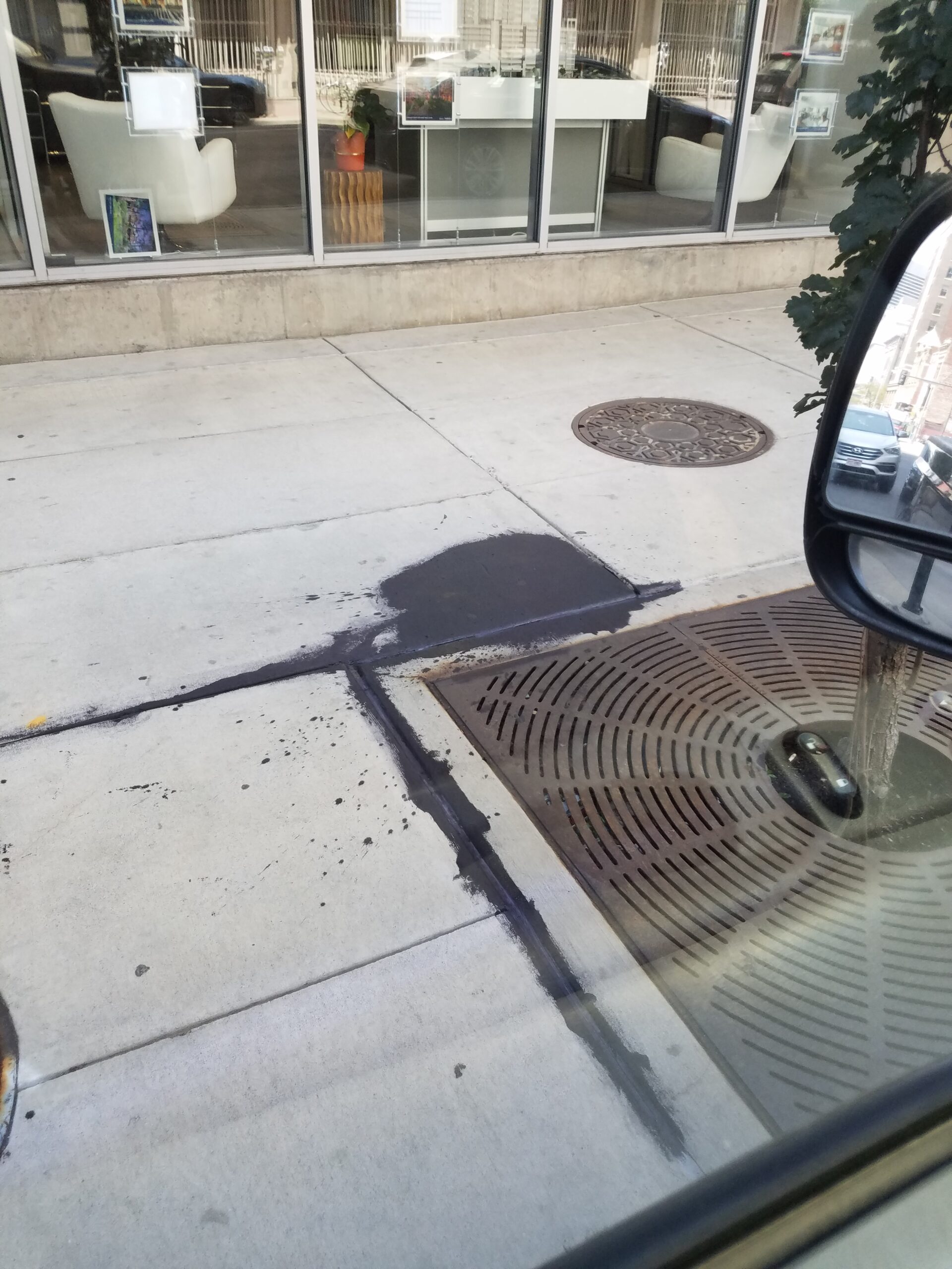 Cleaning Up Spilled Paint on a Denver, Colorado Sidewalk