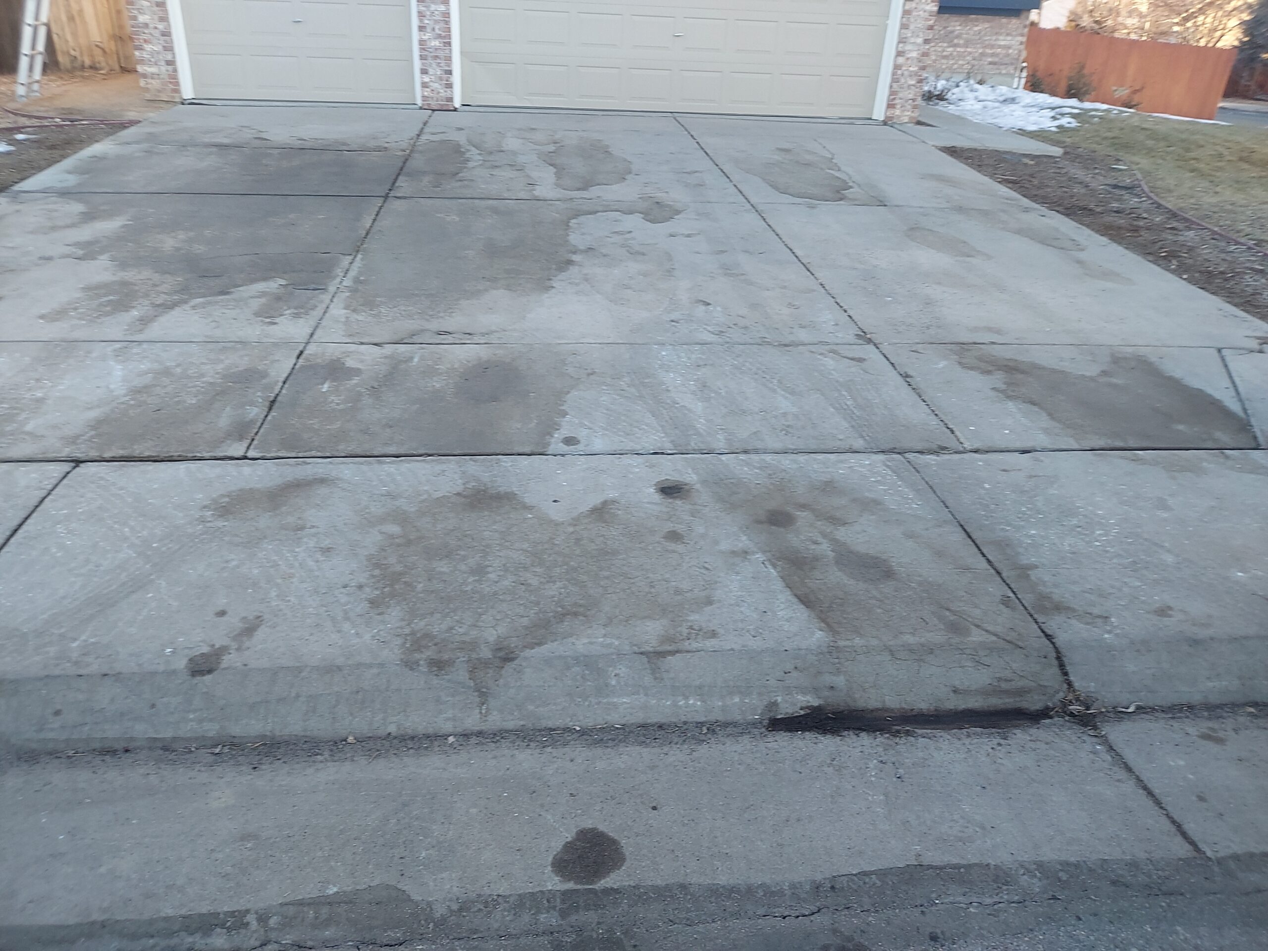 Driveway with oil stains.