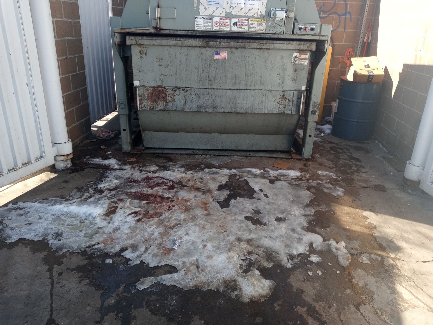 Dumpster Enclosure in Arvada Colorado Before Cleaning