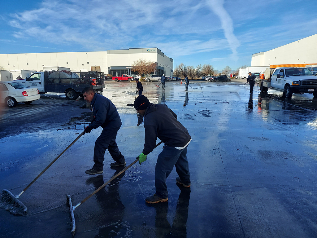 Pressure Washing a Juice Spill in a Warehouse Parking Lot in Aurora