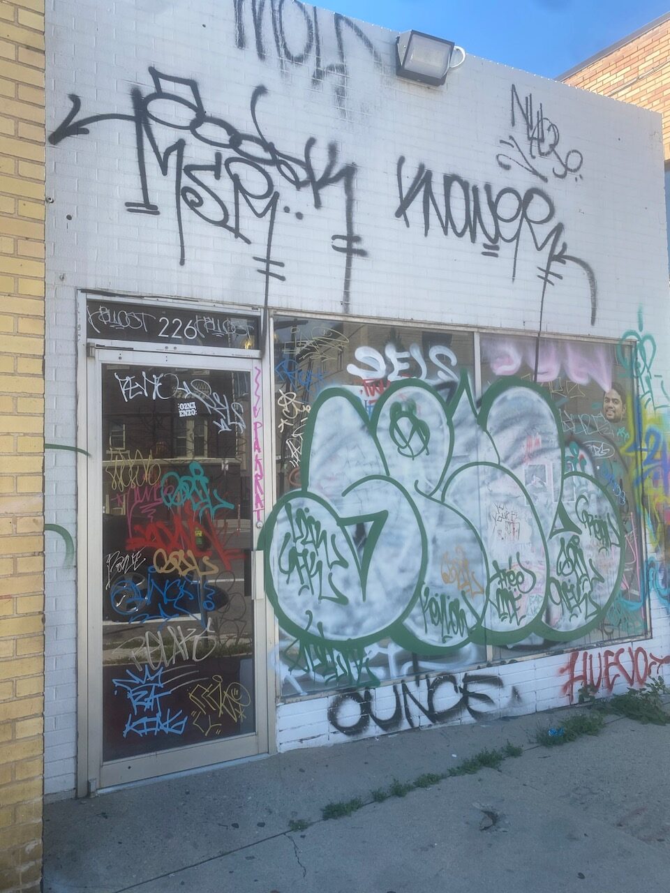 A storefront in Denver, Colorado covered in graffiti