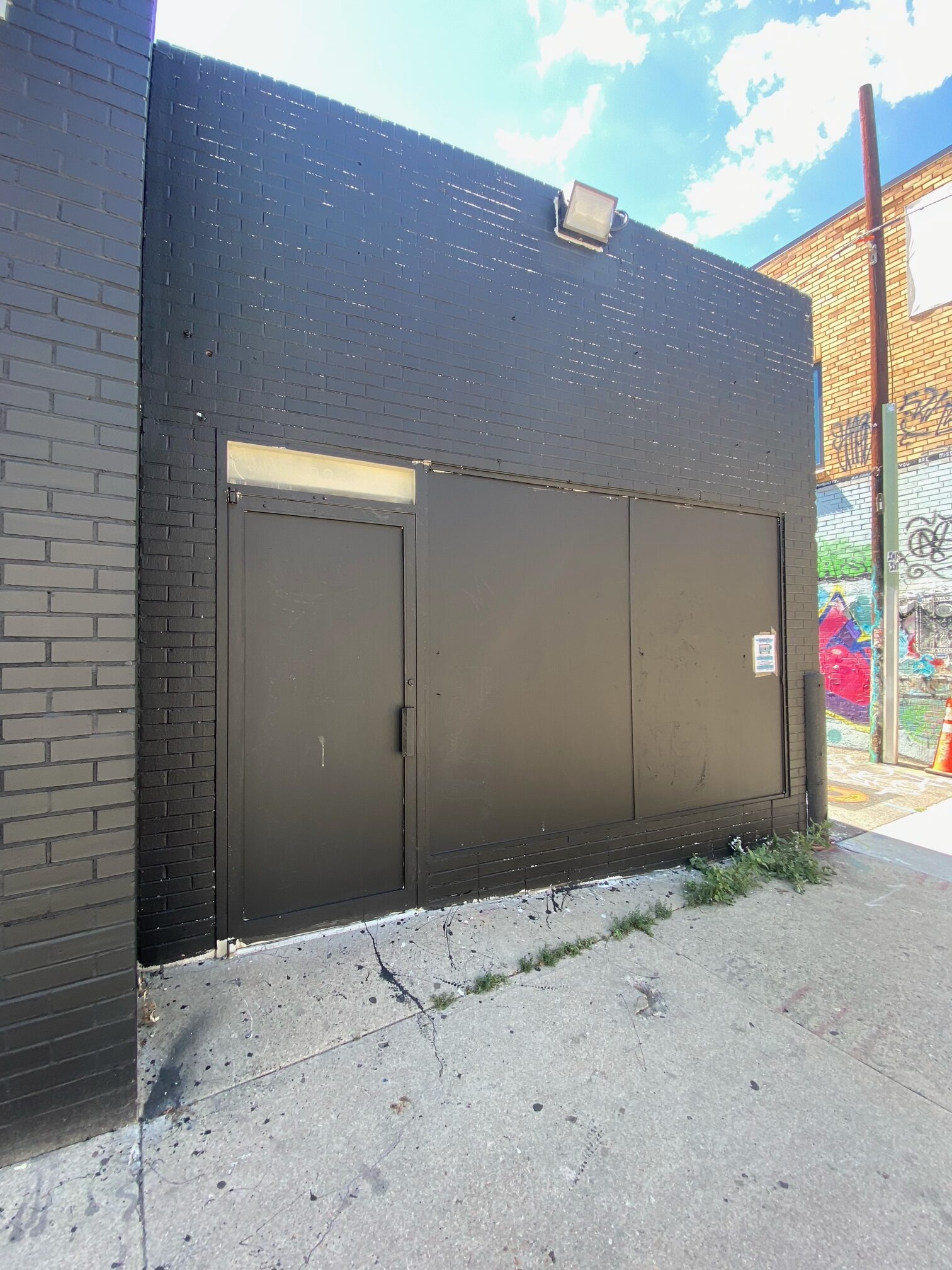 Denver, Colorado's Free Graffiti Removal Program Painted the Whole Building Black