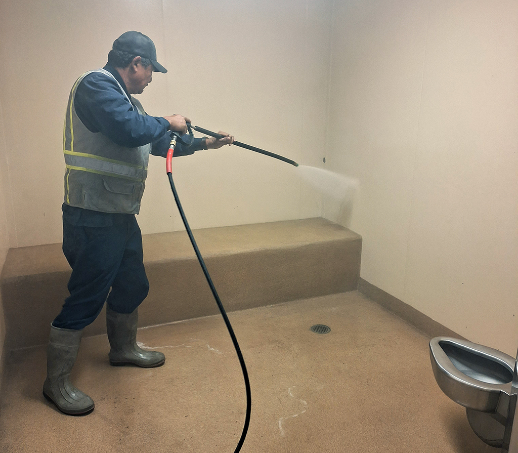 Pressure washing one of the Littleton, Colorado Police Department holding cells